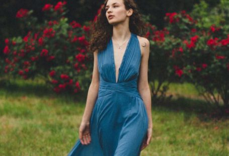 Rose Bushes - Barefoot Woman in Blue Maxi Dress Walk on Lawn