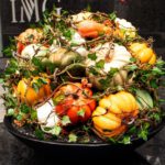 Fall Vegetables - a black bowl filled with lots of different types of fruit