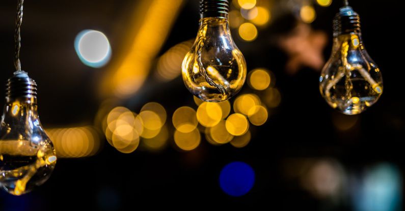 Bulbs - Close-Up Photo of Three Hanging Light Bulbs